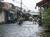 Historic tidal surges flood HCM City